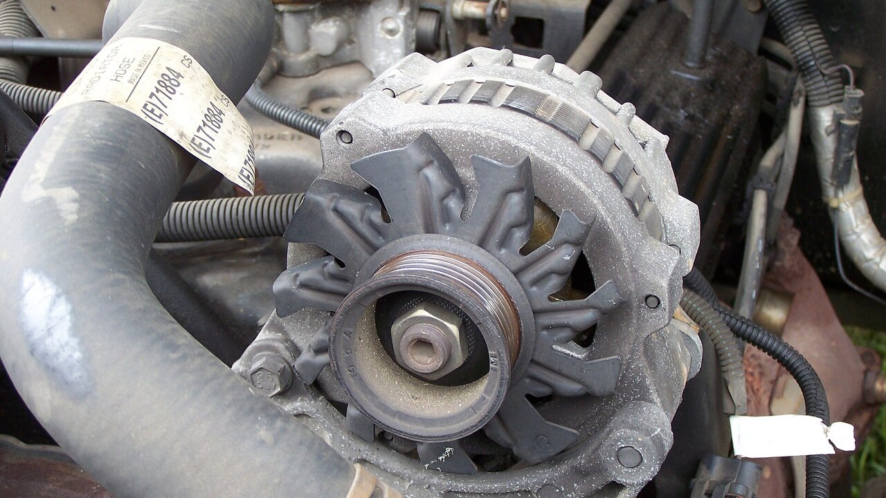 Used automotive alternator removed for recycling